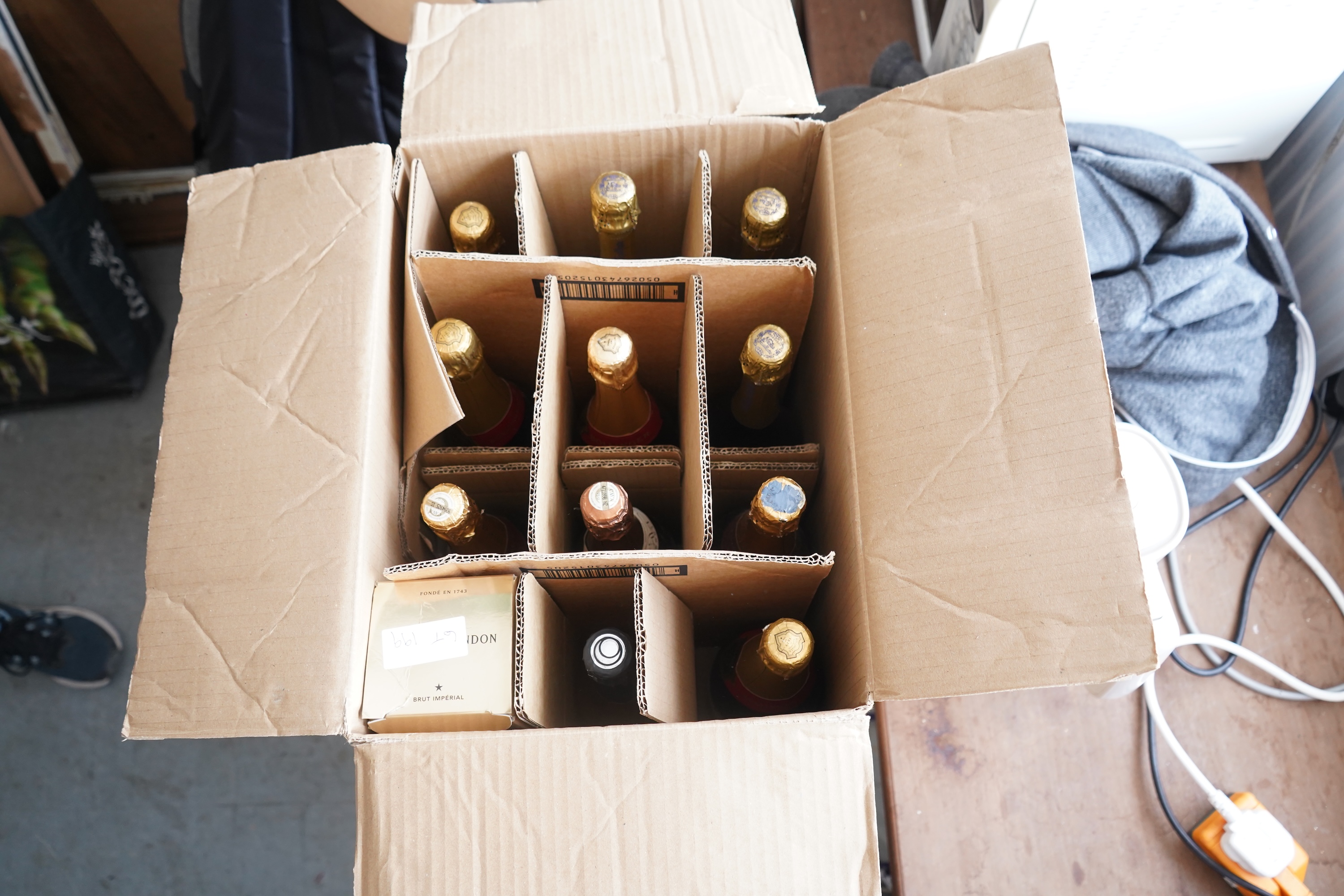 Three bottles of Nicolas Feuillatte Cuvée Spéciale Champagne, four bottles of Bollinger Special Cuvee Champagne, a bottle of Moet, three bottles of Cava and one other (11)